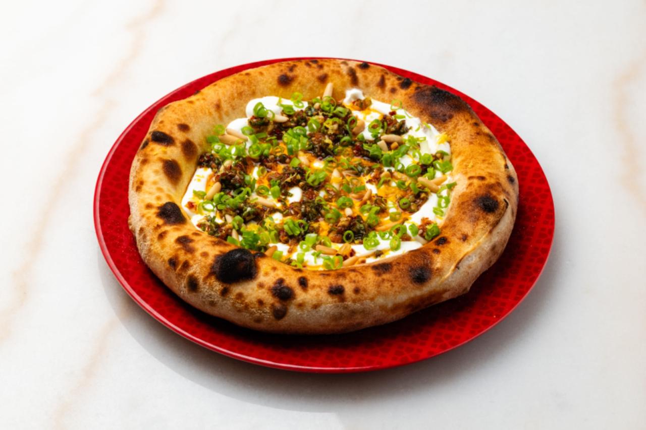 Labneh, Spicy Scallion and Roasted Pine Nuts Khubz Pizza (G,D,N)